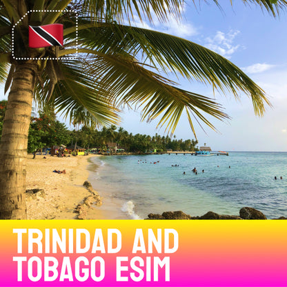 Tropical beach with palm tree, clear blue water, and people enjoying the sun at Pigeon Point Beach, Trinidad and Tobago 